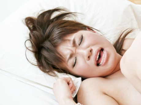 Japanese girl Kana Mimura receives facial cumshots after a double penetration 26576829