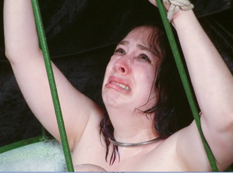 Overweight female sex slave is restrained in a basket during needle play 23113790