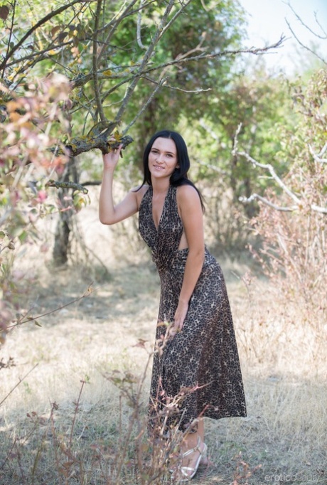 Dark haired teen Indiana Blanc gets totally naked while in a vineyard 51057506
