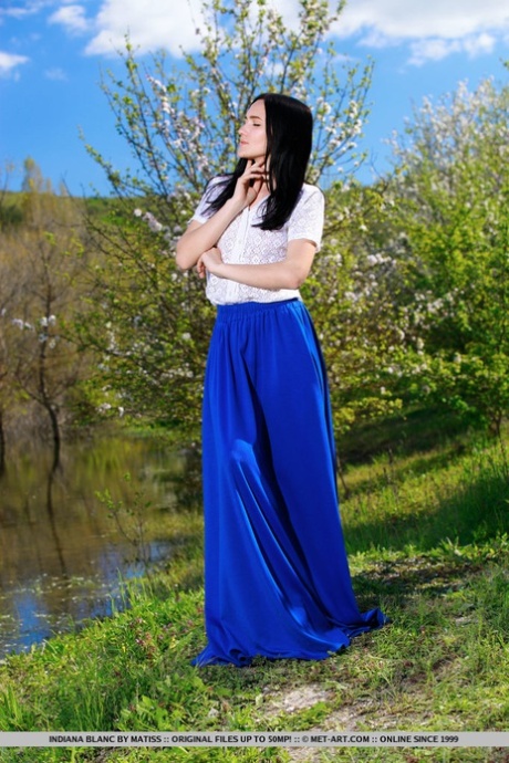 Dark haired teen Indiana Blanc shows her naked body atop her long skirt 63615310
